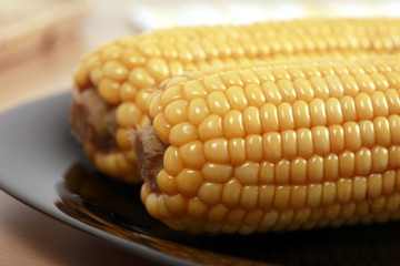 Boiled corn on the cob in a bowl ready to be served.