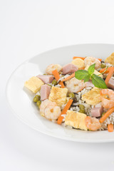 Plate of shrimp fried rice peas ham omelette