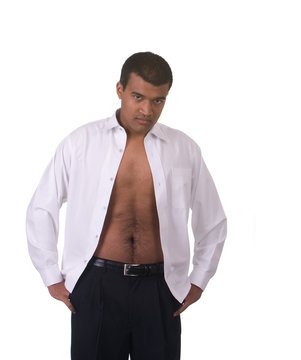 man with unbuttoned shirt showing chest on  white background