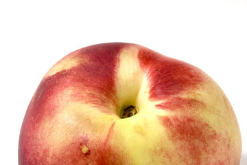 single peach in close up