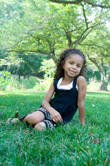 A beautiful mixed race child enjoying the outdoors