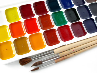 watercolor paints set with brushes