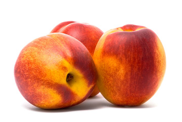 Three beautiful juicy nectarines