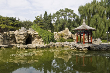Chinese park with lake and pavilion