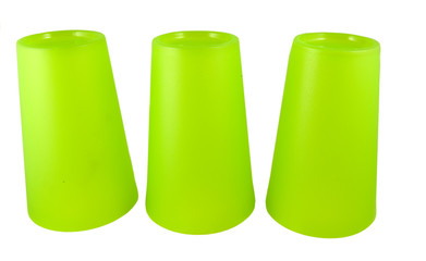 three upside down green plastic cups isolated on white