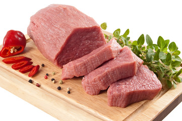Raw beef on cutting board isolated on white background