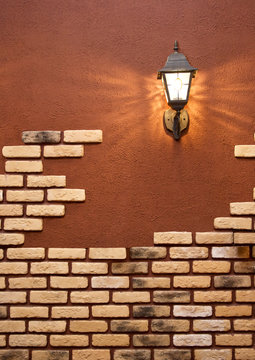 Lantern On A Wall With A Bricklaying