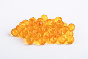 yellow vitamin capsules