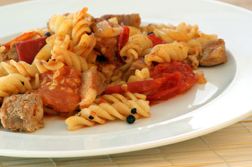 Pasta with baked tomato and chicken meat