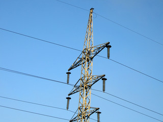electrical powerlines (electricity pylons), blue sky, sunny day
