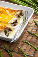 baked tortillas with green asparagus and ham