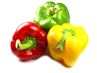 colored peppers on white background