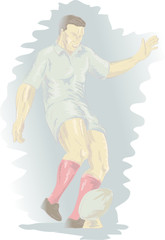 Rugby player kicking the ball