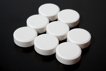 abstract logo of white tablets