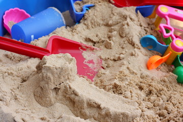Sandpit with colorful toys