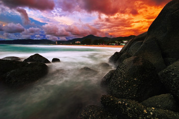 Tropical sunset on the rocks