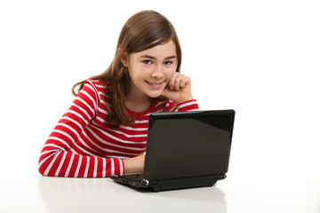 Girl using laptop isolated on white background