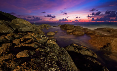 Fototapeta na wymiar Tropical sunset on the rocks