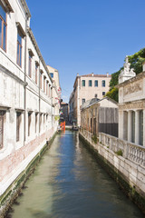 Fototapeta na wymiar Narrow Canal in Venice