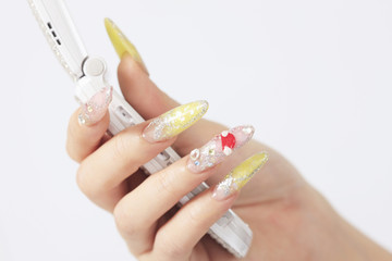 デコ携帯とつけ爪