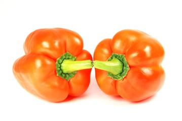 Orange peppers isolated on white