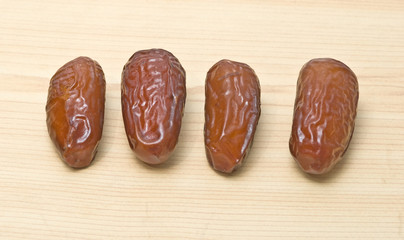 Dried dates isolated on white background