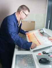 Obraz premium Printer working at offset machine