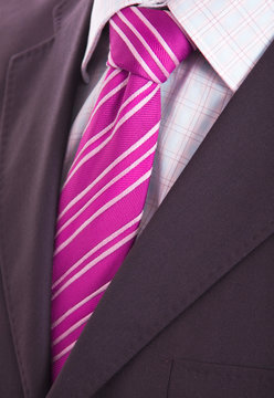 Detail of a Business man Suit with pink tie