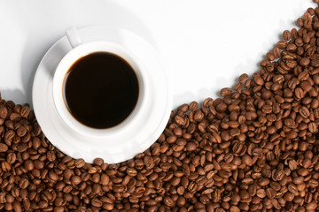 Cup with coffee, costing on coffee grain