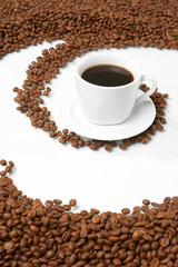 Cup with coffee, costing on coffee grain