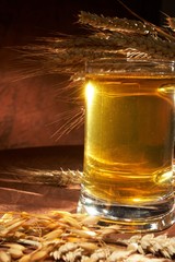 Glass of beer with grain