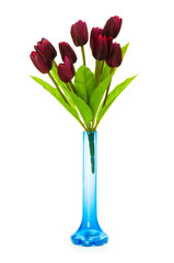 Vase with tulips isolated on white