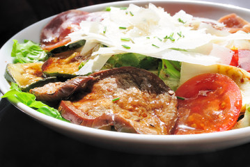 Delicious fresh salad with lettuce, eggplant, zucchini