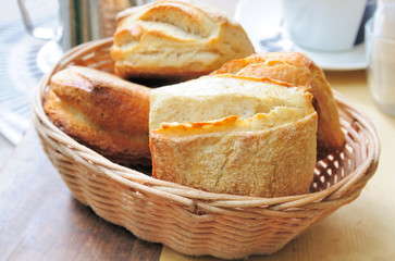 bread in basket - little roll breads in basket on table