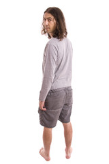 young casual man full body in a white background