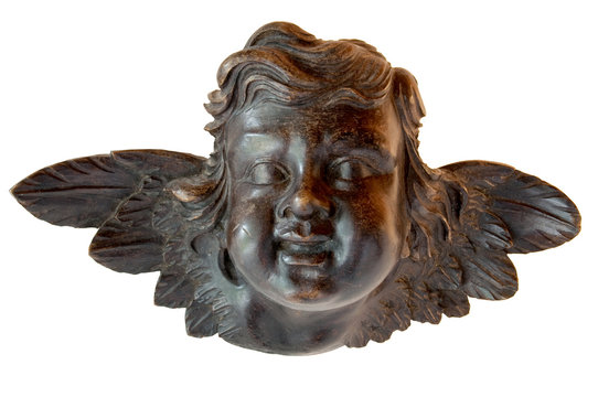 Young angel in sculpted wood