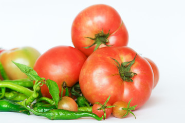 Organic raw tomatoes and peppers
