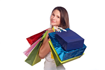 Young woman with colored bags