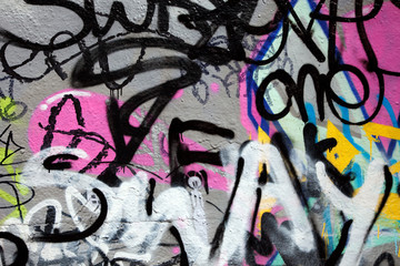 Abstract colorful graffiti background in a wall