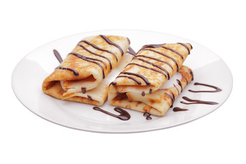 Pancakes with stuffing and chocolate syrup