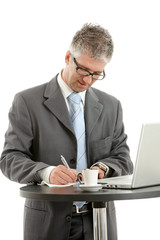 Businessman writing