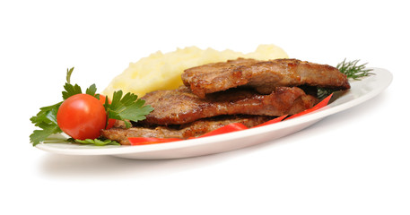 roasted meat with tomatoes and potatoes