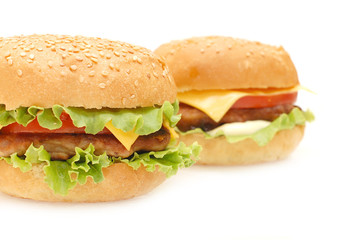 Two hamburgers  isolated on white background