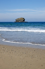Gull rock and Portreath beach in Cornwall UK.