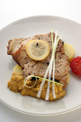 grilled carp fillet with organic vegetable on a plate