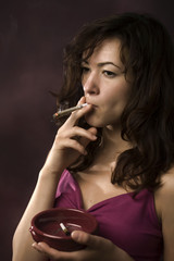 Woman smoking second joint