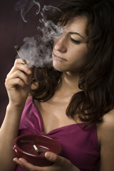 Young woman smoking too much ganja