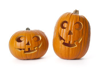 Two Halloween pumpkins on white background
