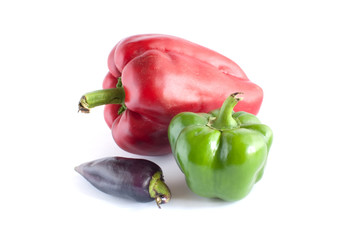 Three many-coloured sweet peppers