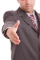 Young engineer, offering handshake